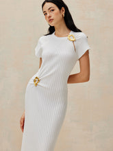 Pulloverkleid mit Metallverzierung